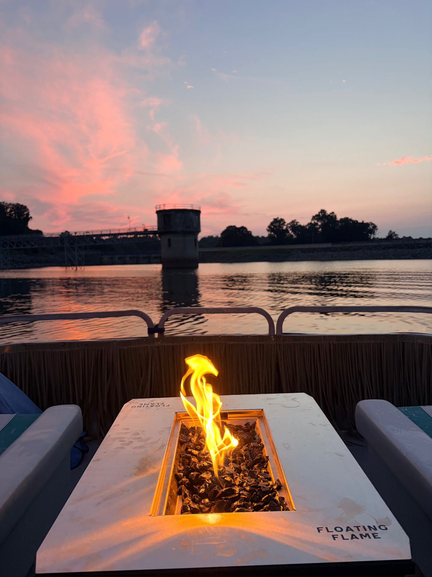 Propane fire pit burning on the boat deck